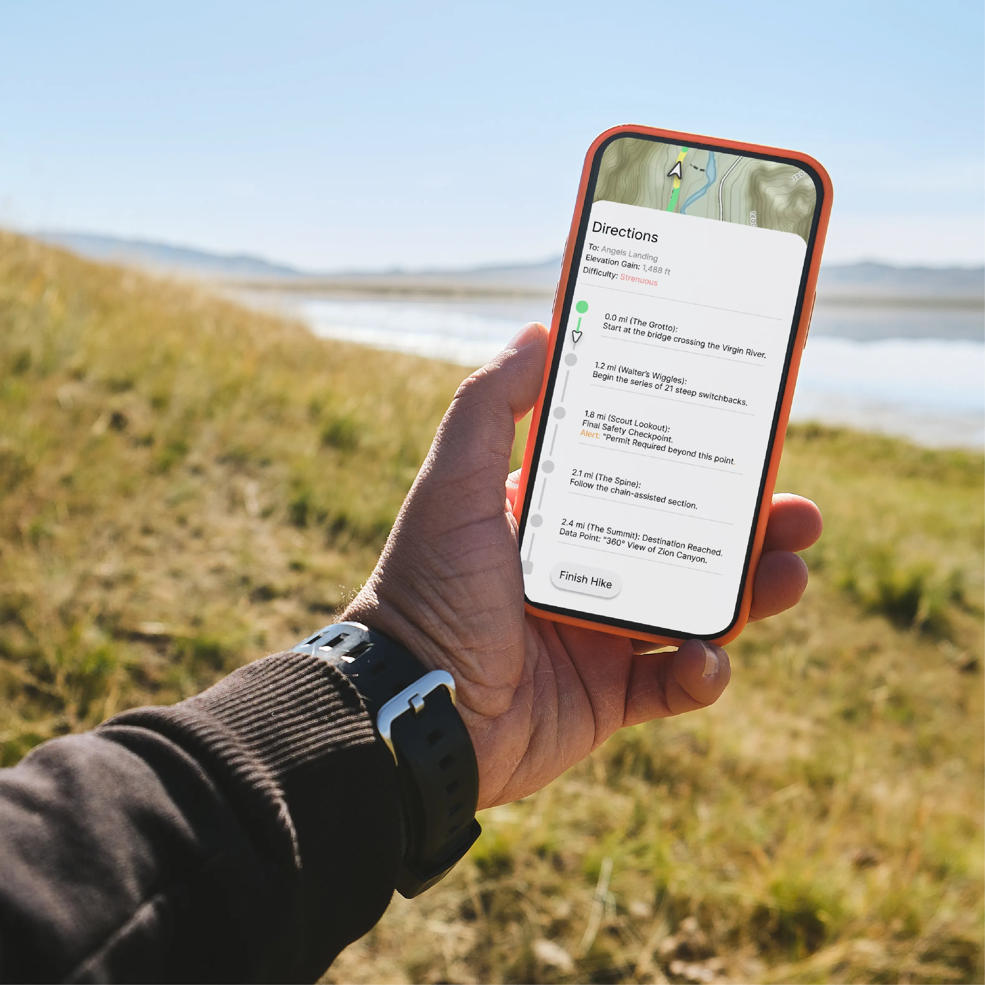 TREK app directions screen shown on a phone held outdoors